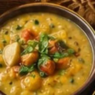 A bowl of dal finished with a tempering
